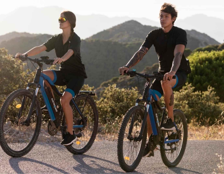Close up on couple with electric bikes