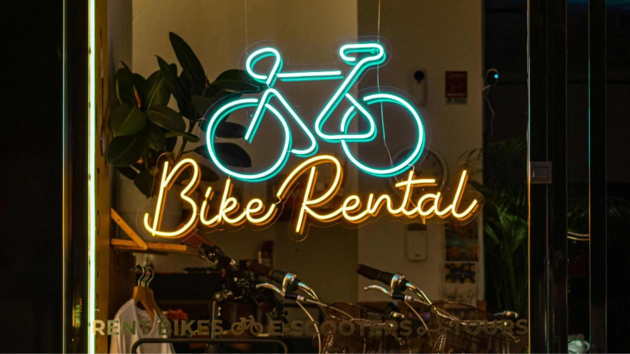Neon Sign of a Bike Rental Shop